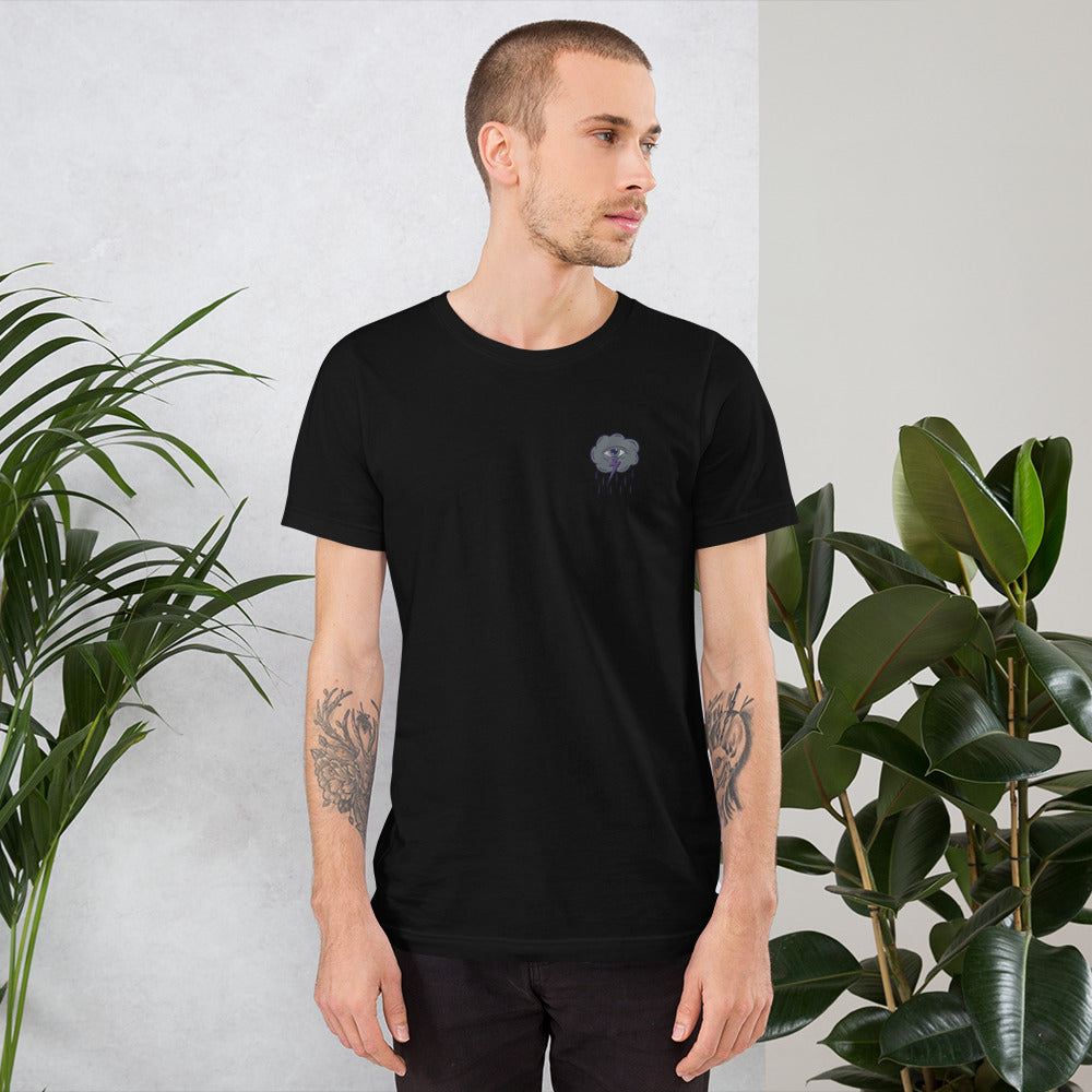 Man wearing NOMADA Rain cloud with lightning bolt and eye embroidered T-shirt, Black color shirt