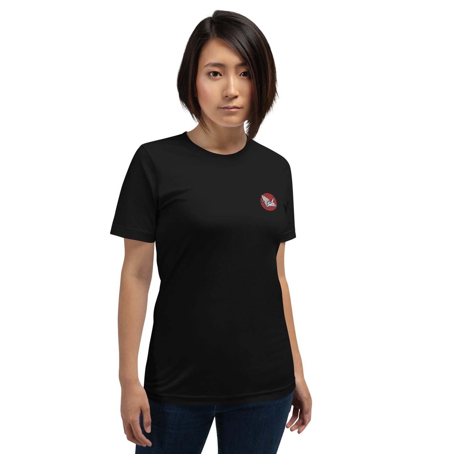Woman wearing NOMADA Origami Crane embroidered t-shirt, Black color shirt.