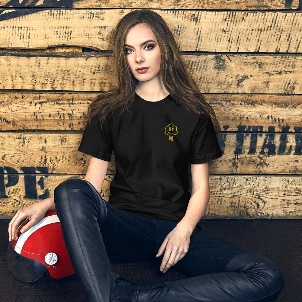 Woman wearing NOMADA Melting Smiley Face embroidered T-shirt, Black color shirt